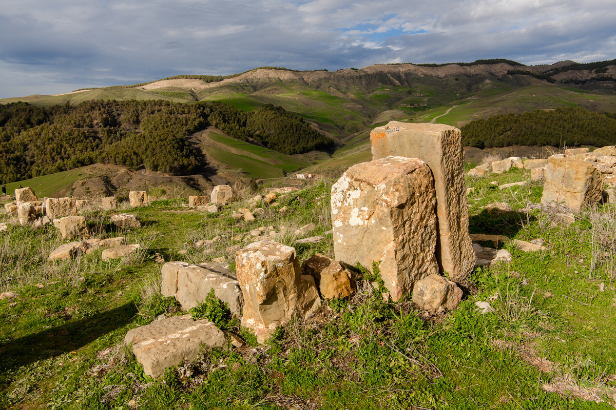 Ruins and the nature of Djemila, the archaeological zone of the well preserved Berber-Roman ruins in North Africa, Algeria. UNESCO World Heritage Site